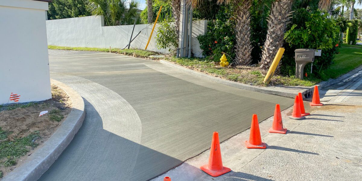 Freshly poured concrete commercial driveway by Mad Jack's Asphalt & Concrete, LLC