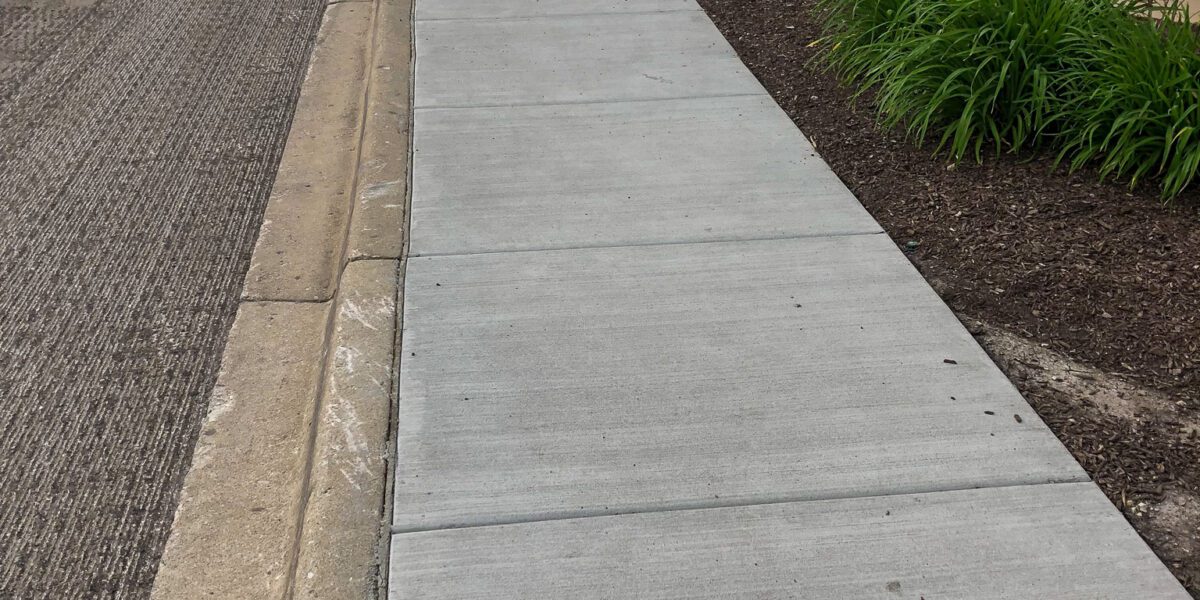 Concrete Sidewalk by Mad Jack's Asphalt & Concrete, LLC