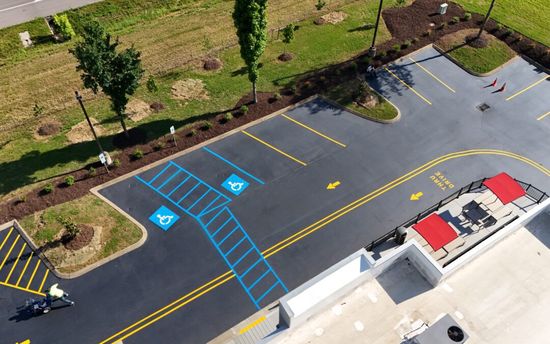 aerial photo of an asphalt seal coated with lot stripiong