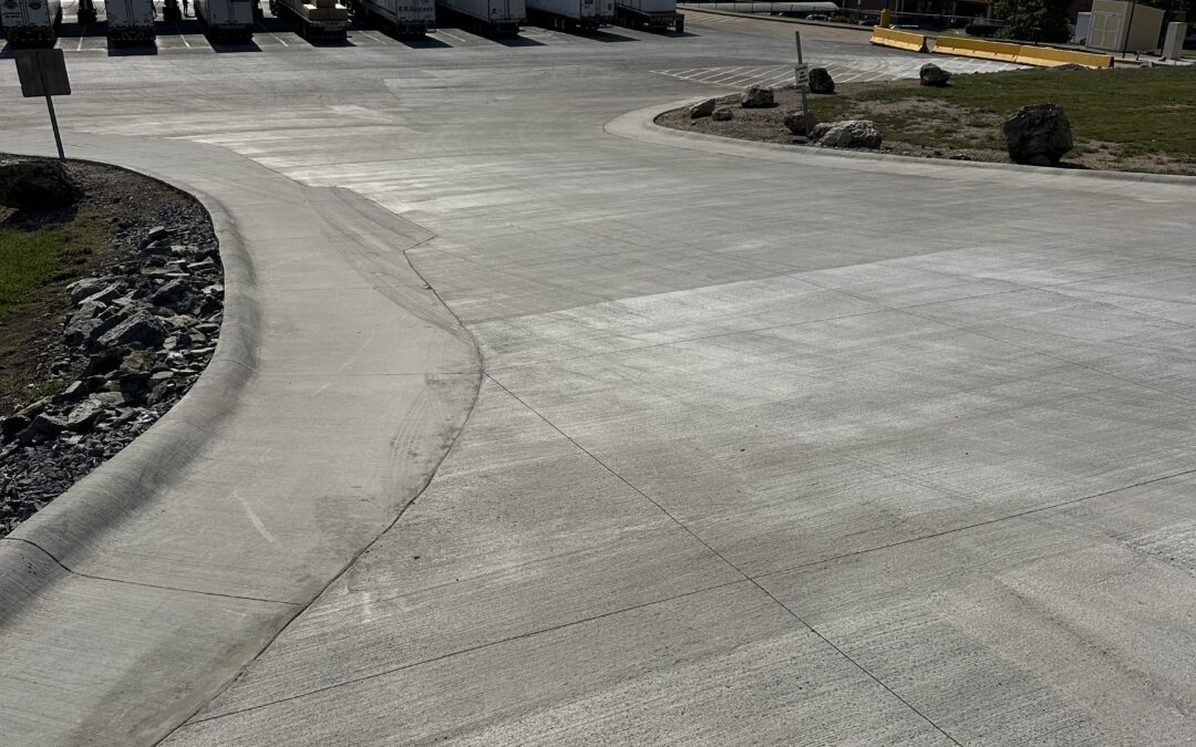 concrete entrance in a commercial parking lot. pavement design for commercial properties