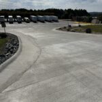 concrete entrance in a commercial parking lot. pavement design for commercial properties