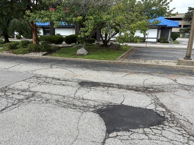 Pothole repair done by Mad Jack's Asphalt & Concrete